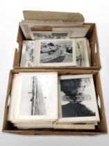 A large quantity of monochrome photographs laid to card including landscapes, architecture, etc.