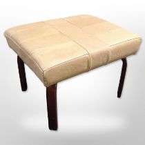 A Stouby bentwood-framed rectangular footstool in stitched tan leather, width 52cm.