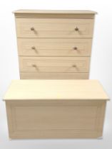 A contemporary pine-effect five-drawer chest, 77cm wide x 41cm deep x 115cm high,