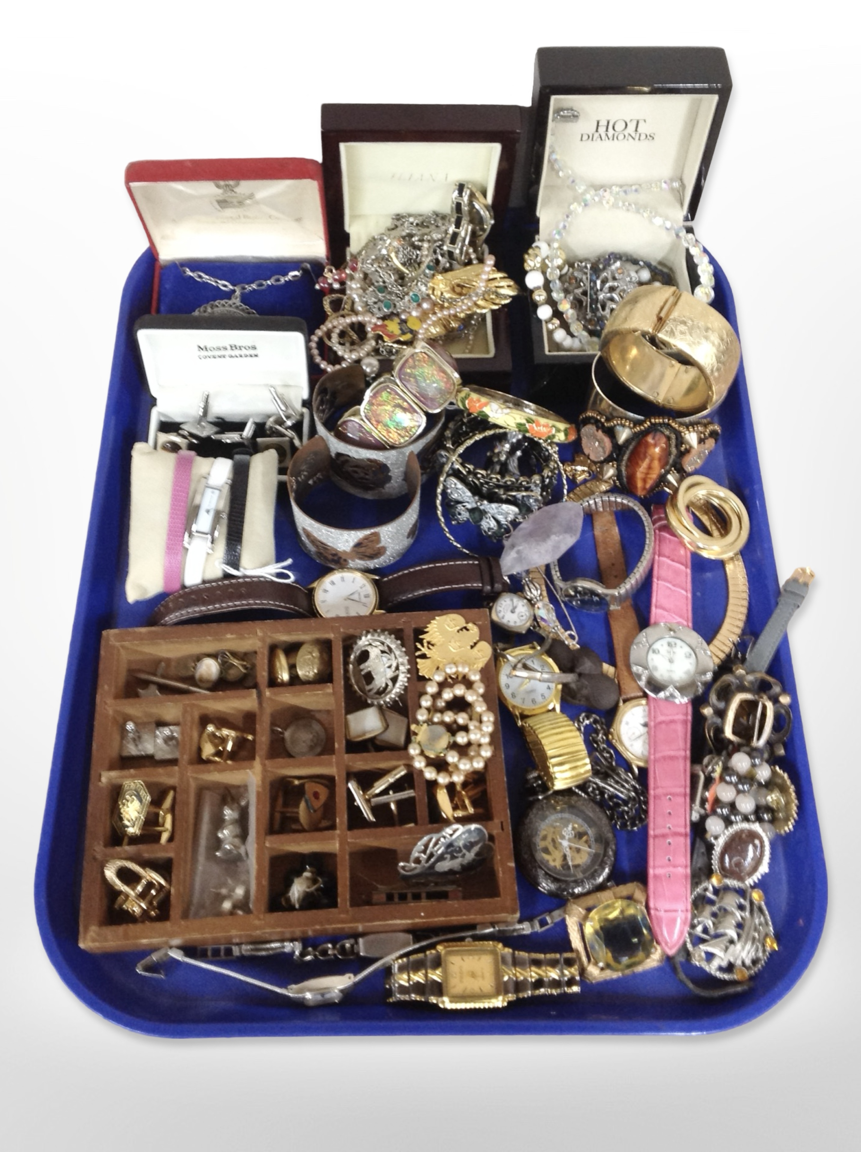 A collection of costume jewellery including bangles, cufflinks, bead necklaces,