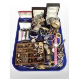 A collection of costume jewellery including bangles, cufflinks, bead necklaces,