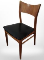 A 20th-century Danish teak and black vinyl dining chair with laminated back rest.