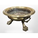 A large 19th century brass brazier on claw and ball feet, diameter 58cm.