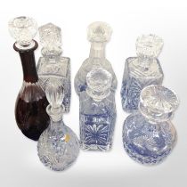 Seven crystal decanters.