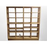 Four Scandinavian pine and MDF open bookcases, each approximately 90cm wide x 39cm deep x 90cm high.