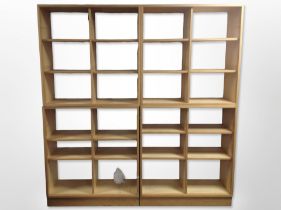 Four Scandinavian pine and MDF open bookcases, each approximately 90cm wide x 39cm deep x 90cm high.