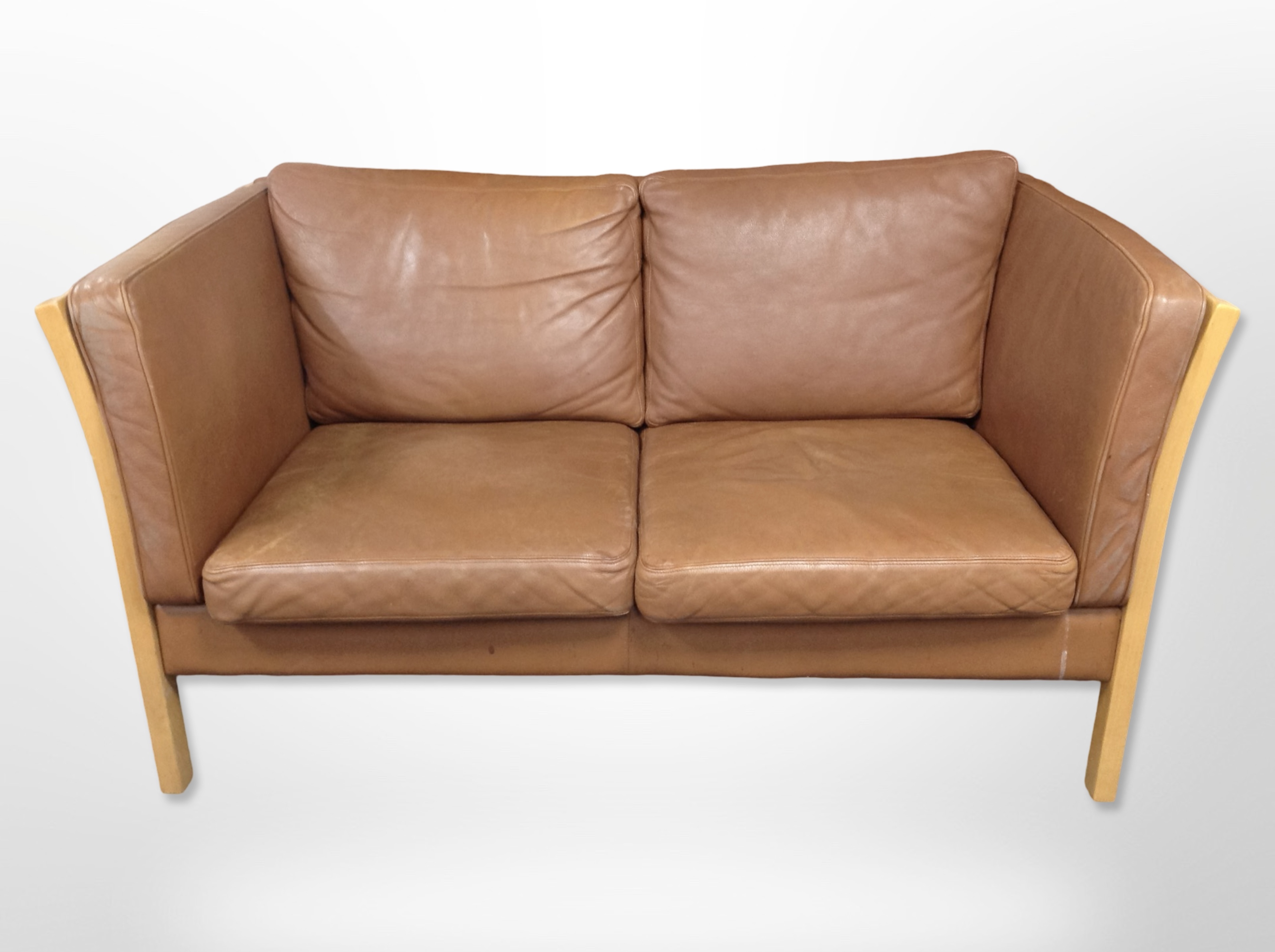 A late-20th century Danish brown stitched leather two-seater settee, with beech frame,