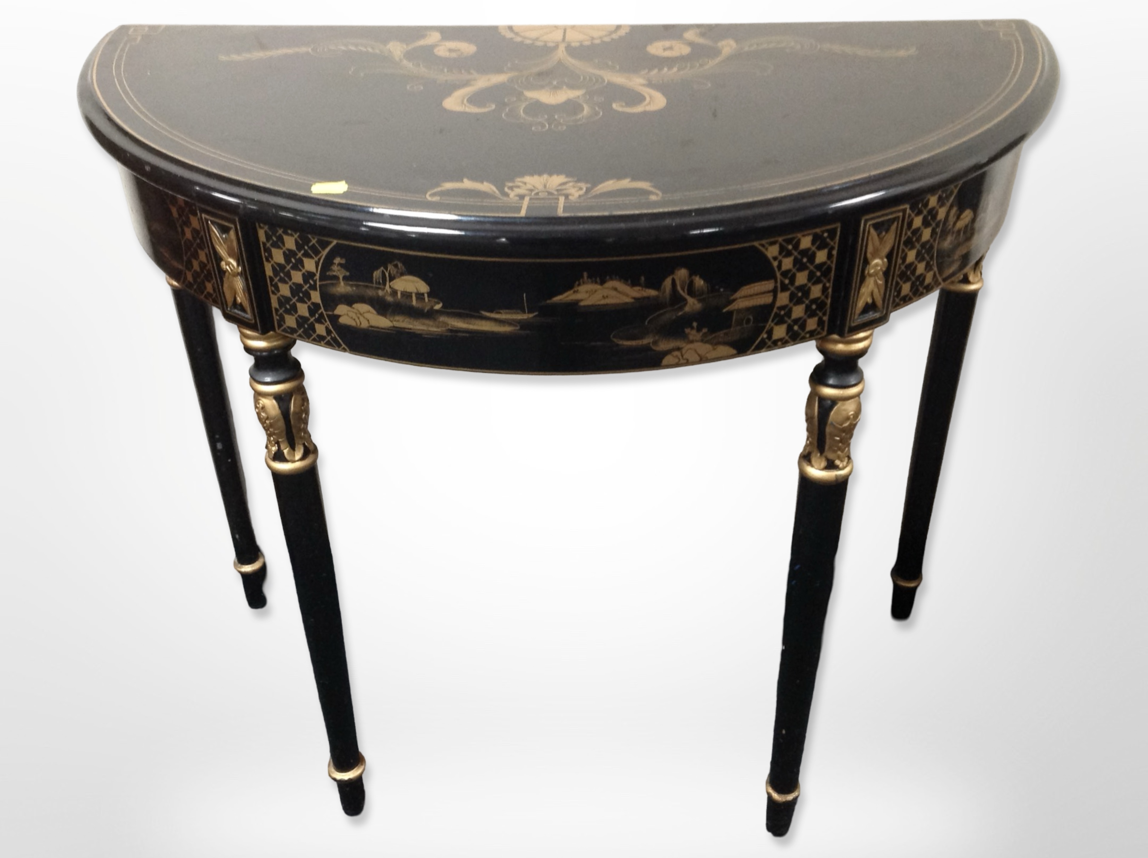 A contemporary Japanese-style lacquered and gilt demi-lune table, 92cm wide x 46cm deep x 77cm high.