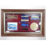 A Matchbox bus montage in glazed display case, 53cm x 33cm.