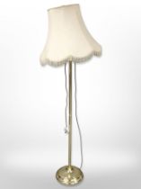 A contemporary brass standard lamp, height 160cm.
