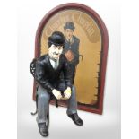 A painted Charlie Chaplin panel,