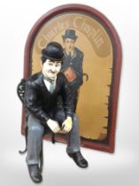 A painted Charlie Chaplin panel,