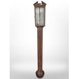 A 19th-century mahogany mercury stick barometer by Ortelly & Co., Macclesfield, length 97cm.