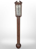 A 19th-century mahogany mercury stick barometer by Ortelly & Co., Macclesfield, length 97cm.