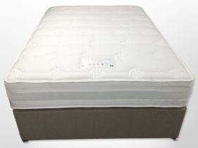 A Brooklyns Beds cadenza 4ft 6 mattress with divan base.