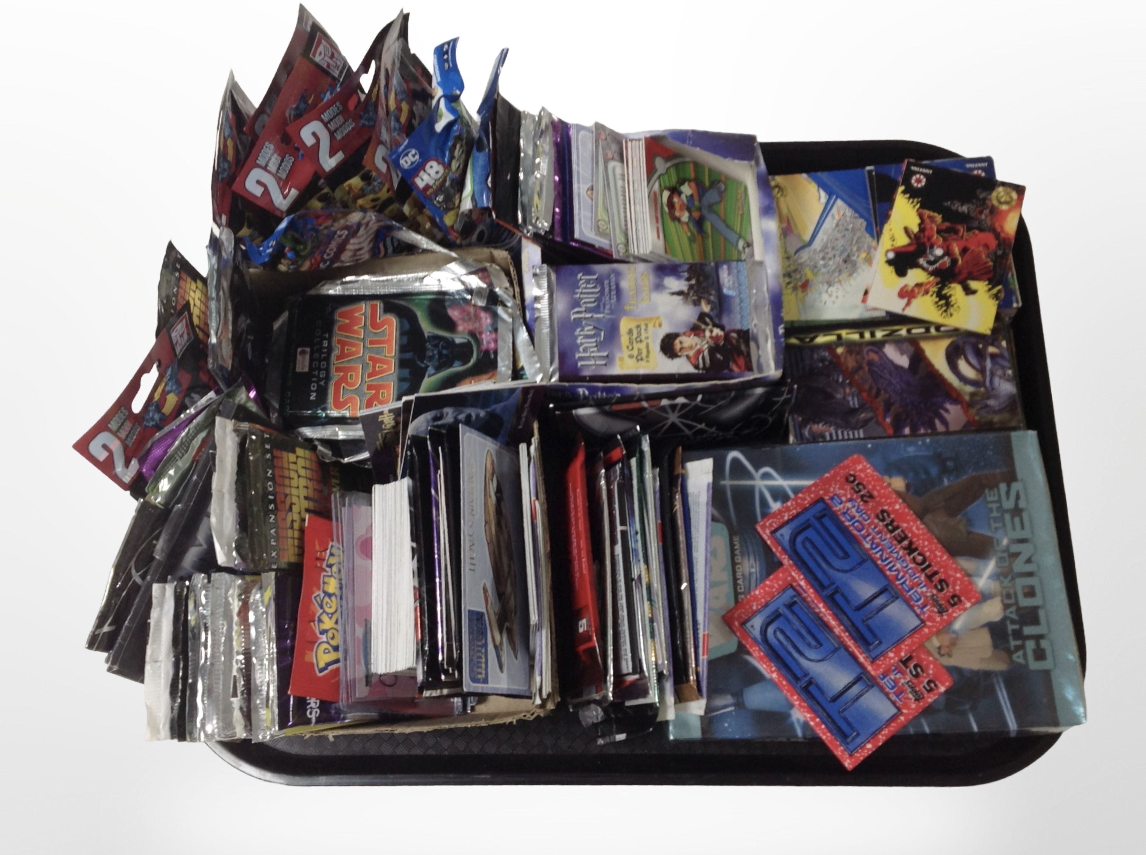 A group of trading cards to include Star Wars, Harry Potter, Pokémon, etc.
