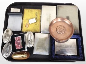 A group of table lighters, cigarette boxes, copper dish, etc.