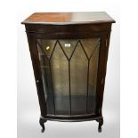 A reproduction mahogany glazed bow-front display cabinet, 61cm wide x 35cm deep x 113cm high.