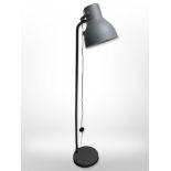 A contemporary standard lamp in grey metallic finish, height 180cm.
