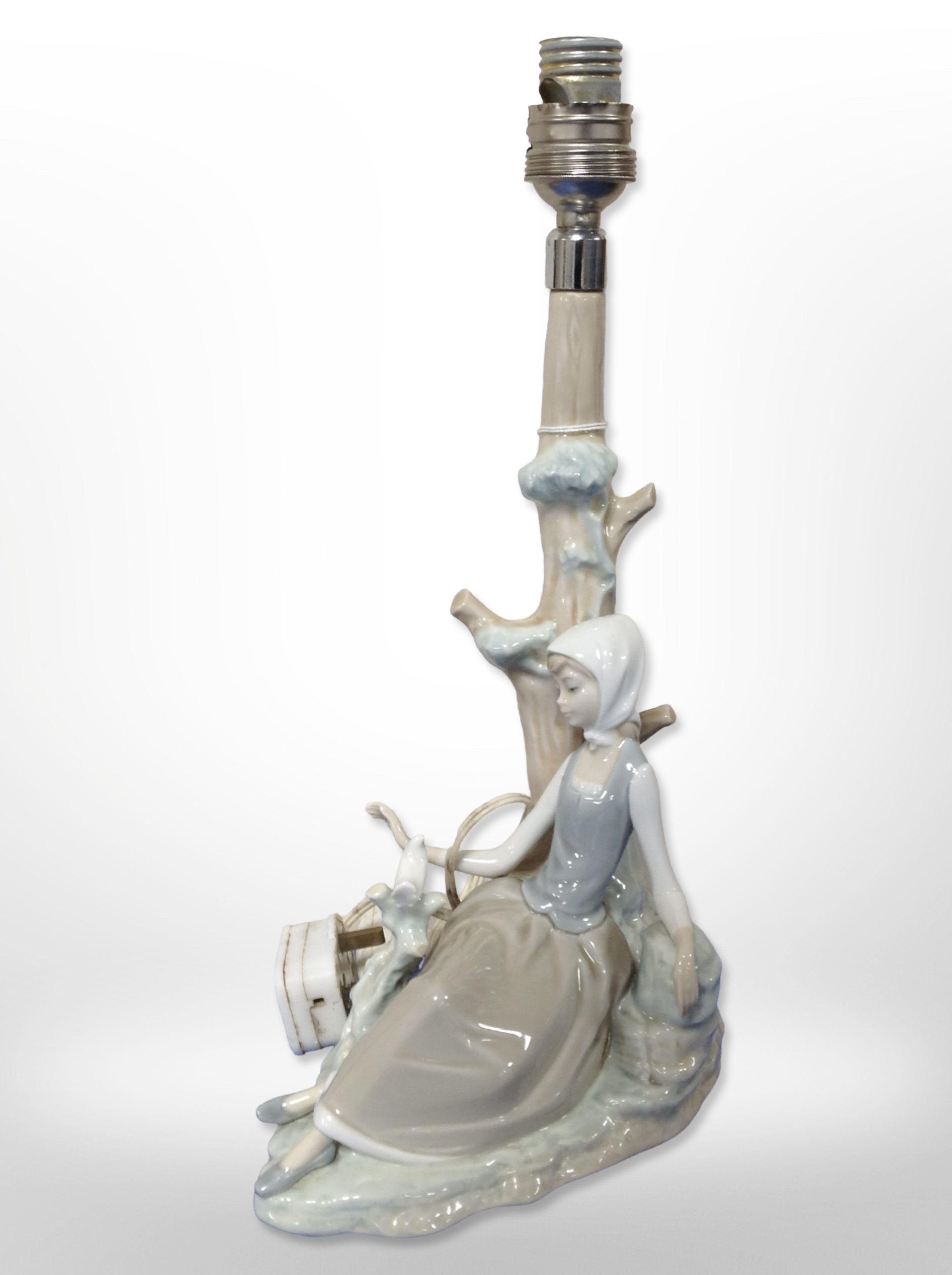 A Lladró figural lamp base modelled as a lady sat against a tree stump, - Image 2 of 2