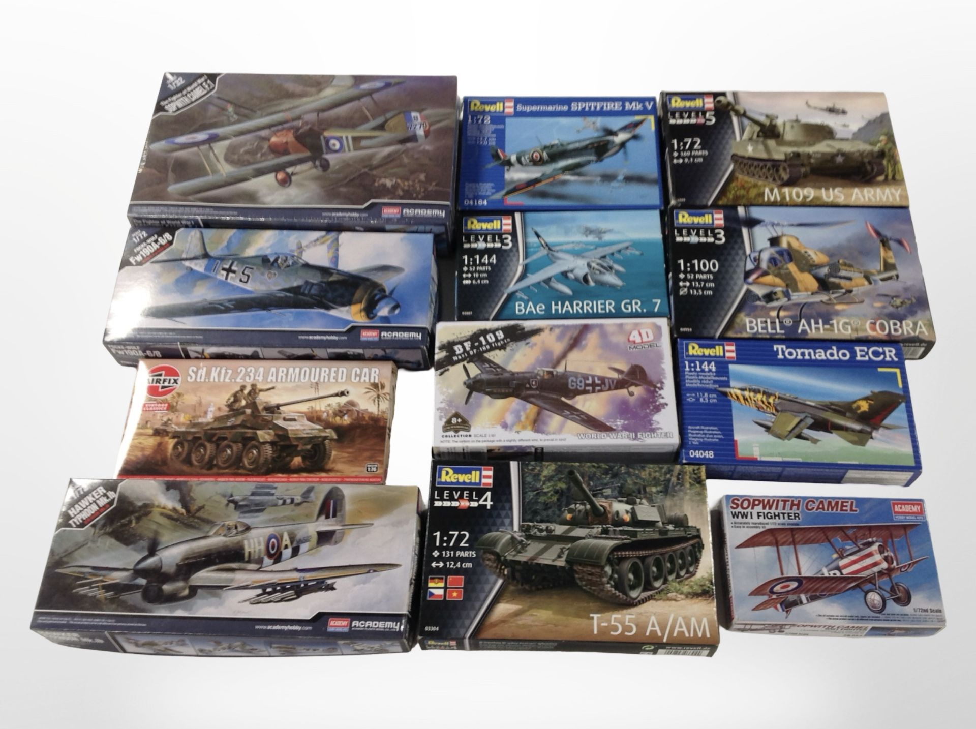 12 Revell, Airfix, and Academy scale modelling sets to include military aircraft and tanks,