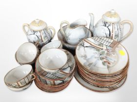 Approximately 38 pieces of Japanese export eggshell porcelain tea china.