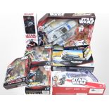 Seven Hasbro Disney Star Wars figurines/models, boxed.