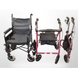 A folding wheelchair and two mobility walking aids.
