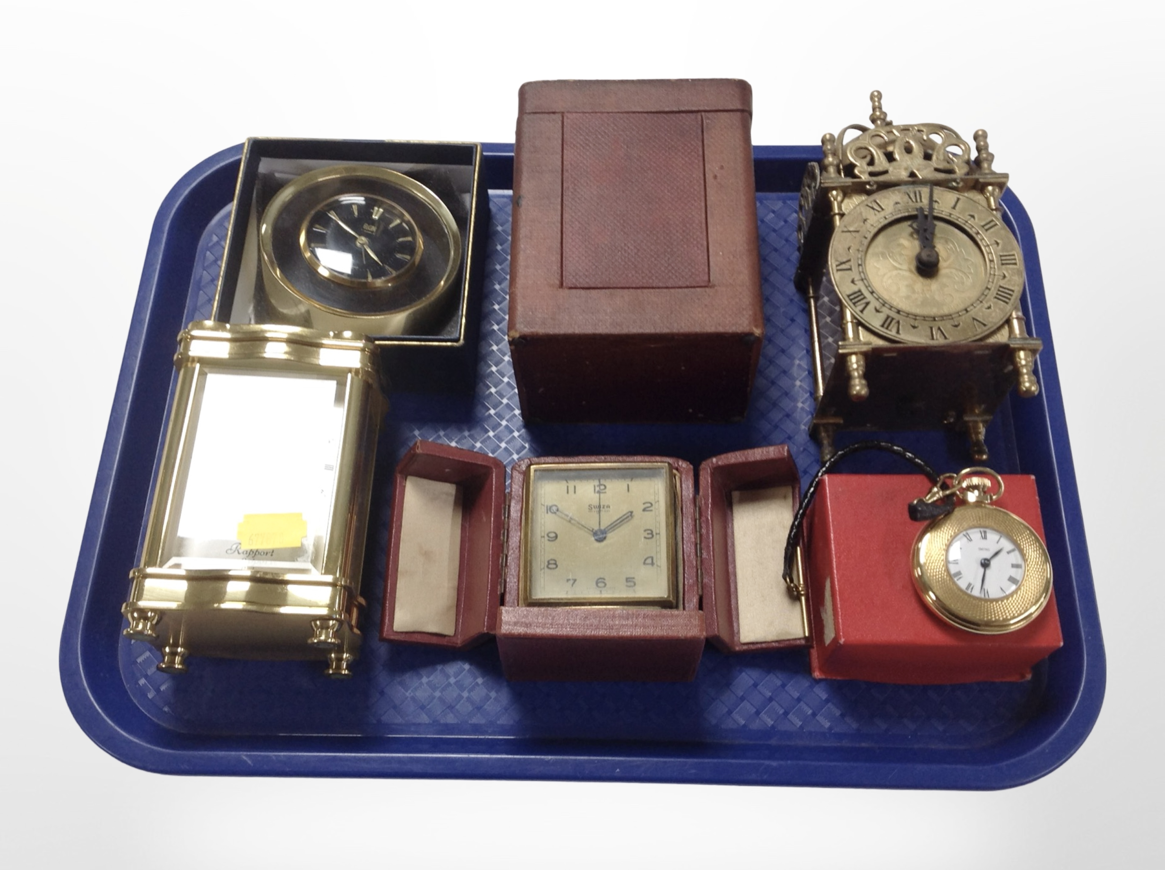 A Rapport brass-cased quartz carriage timepiece, together with a Swiza mignon timepiece in box,