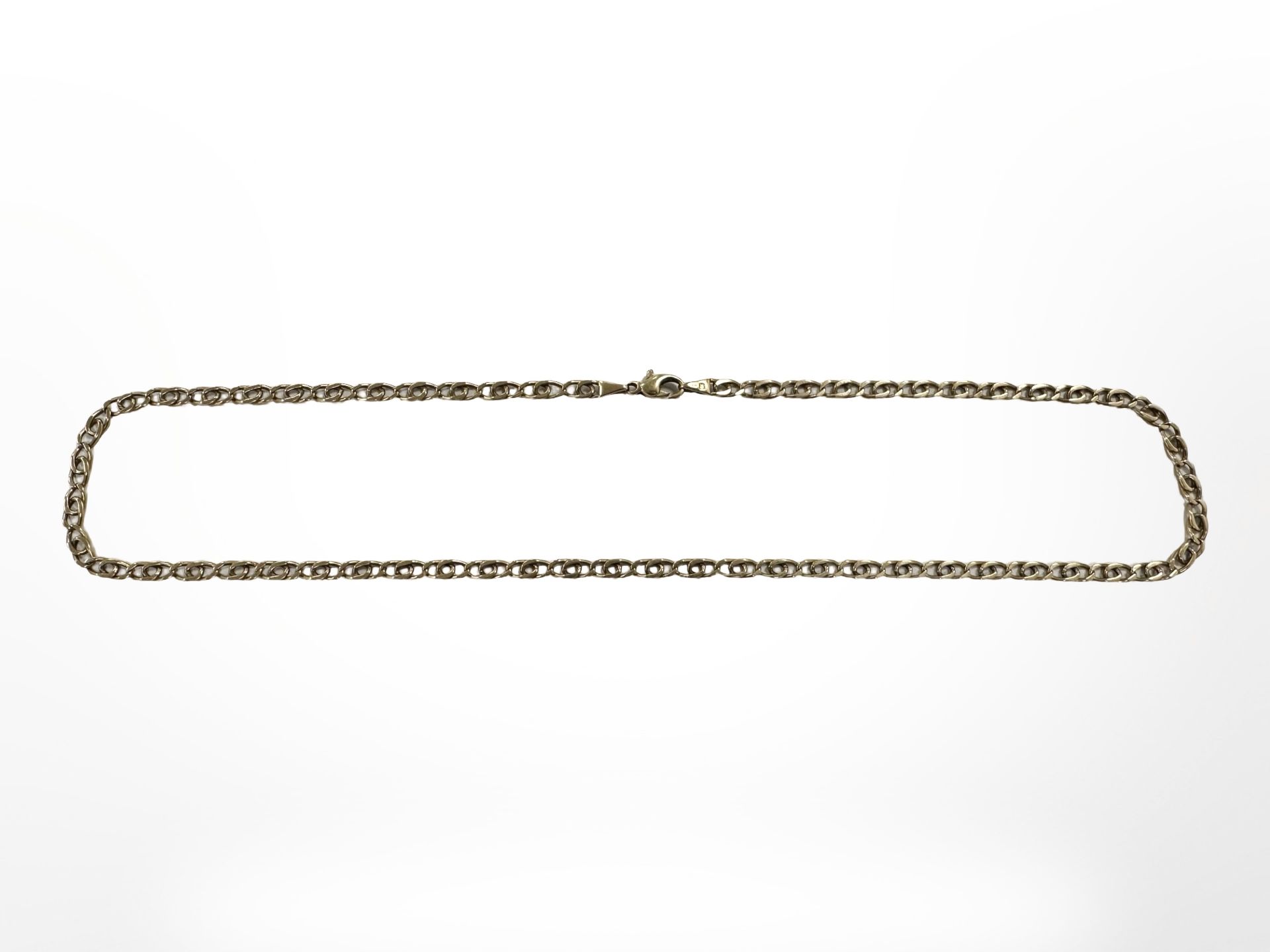 A 9ct gold flat link chain, length 53cm CONDITION REPORT: 15.