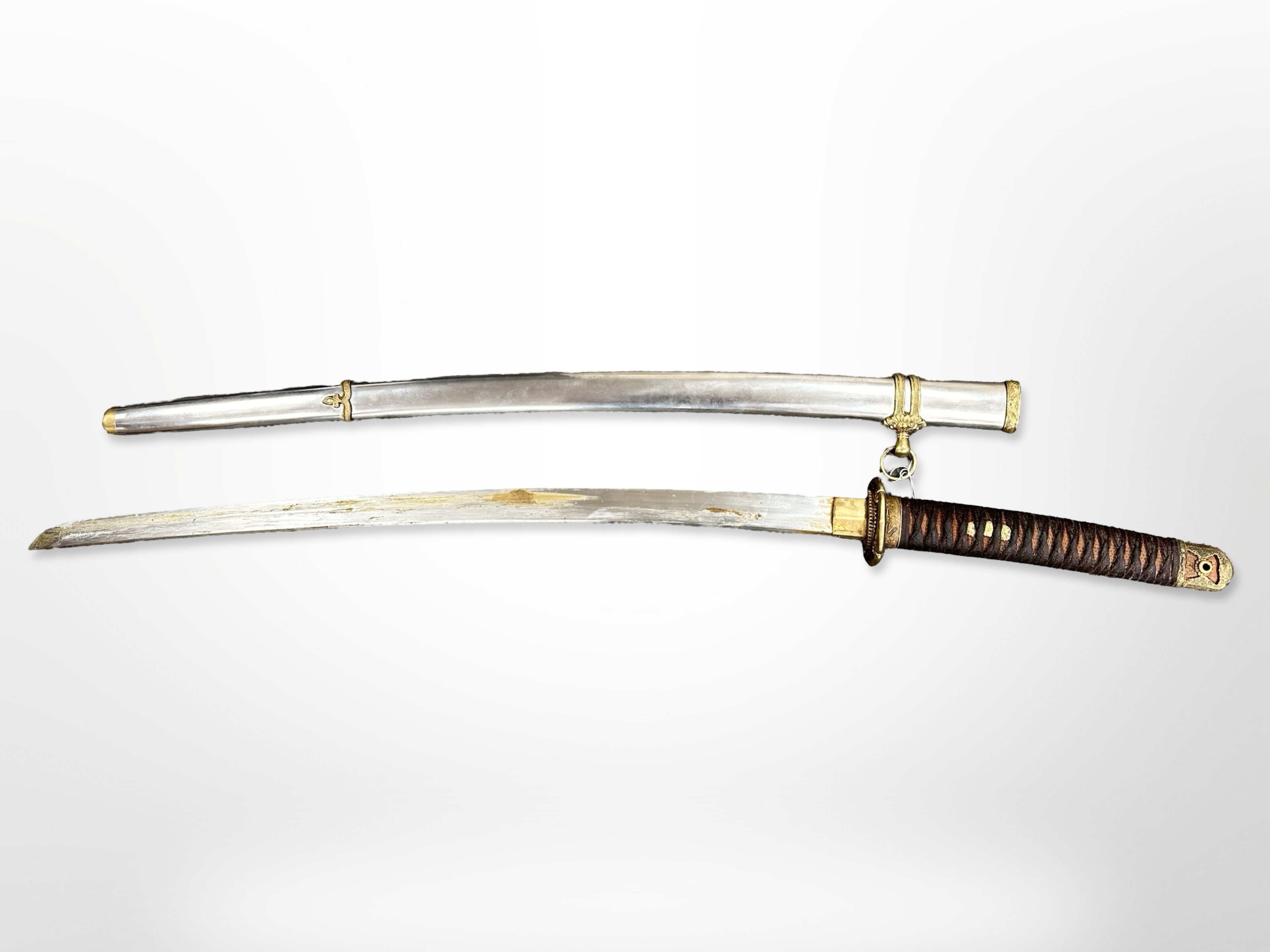 A 19th century-style Japanese samurai sword with brass-mounted saya and leather rope twist tsuka,