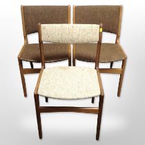 Three 20th-century Scandinavian teak-framed dining chairs.
