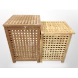 Two 20th-century teak lattice laundry hampers, largest 48cm wide.