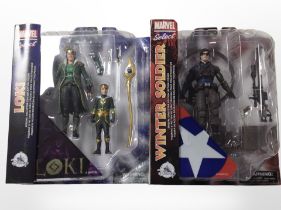 Two Marvel Select figurines, Loki and the Winter Soldier, boxed.