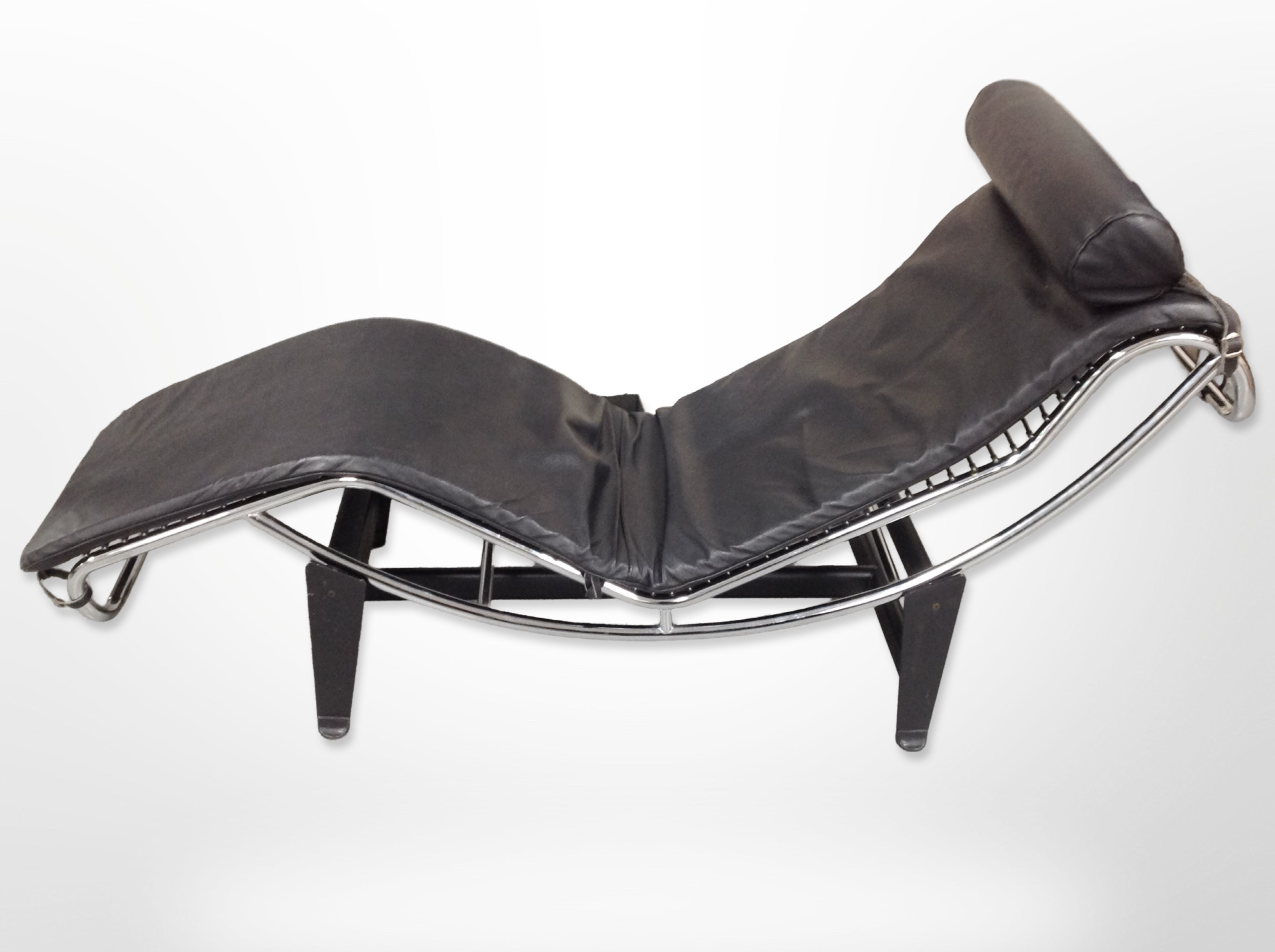 After Le Corbusier, a model LC4 lounge chair.