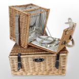 Two wicker picnic hampers.