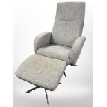 A contemporary Scandinavian swivel armchair in grey upholstery on chrome pedestal support with