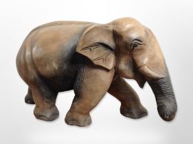 A carved hardwood elephant, height 30cm.