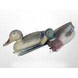 Two plastic decoy ducks.