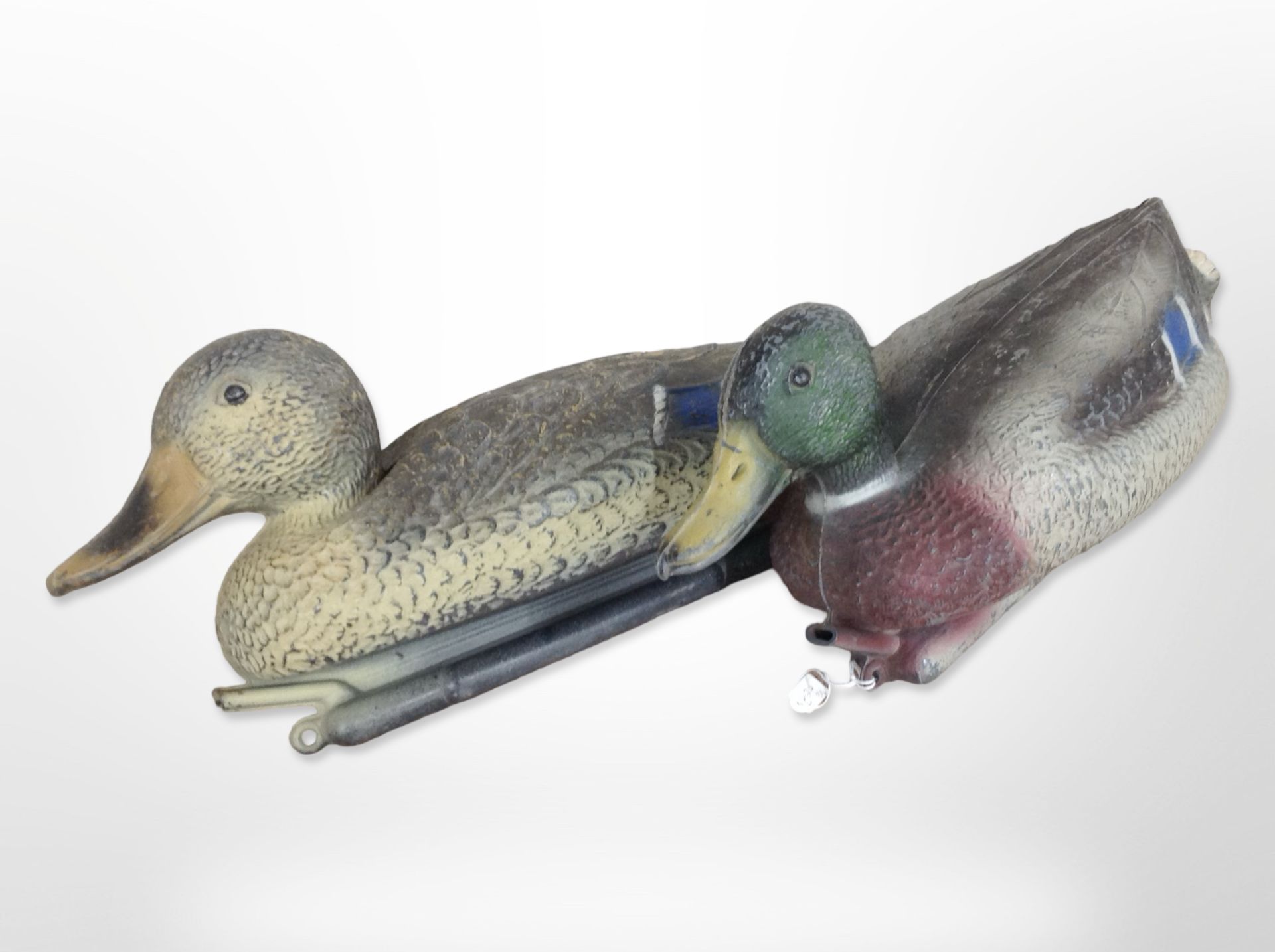 Two plastic decoy ducks.