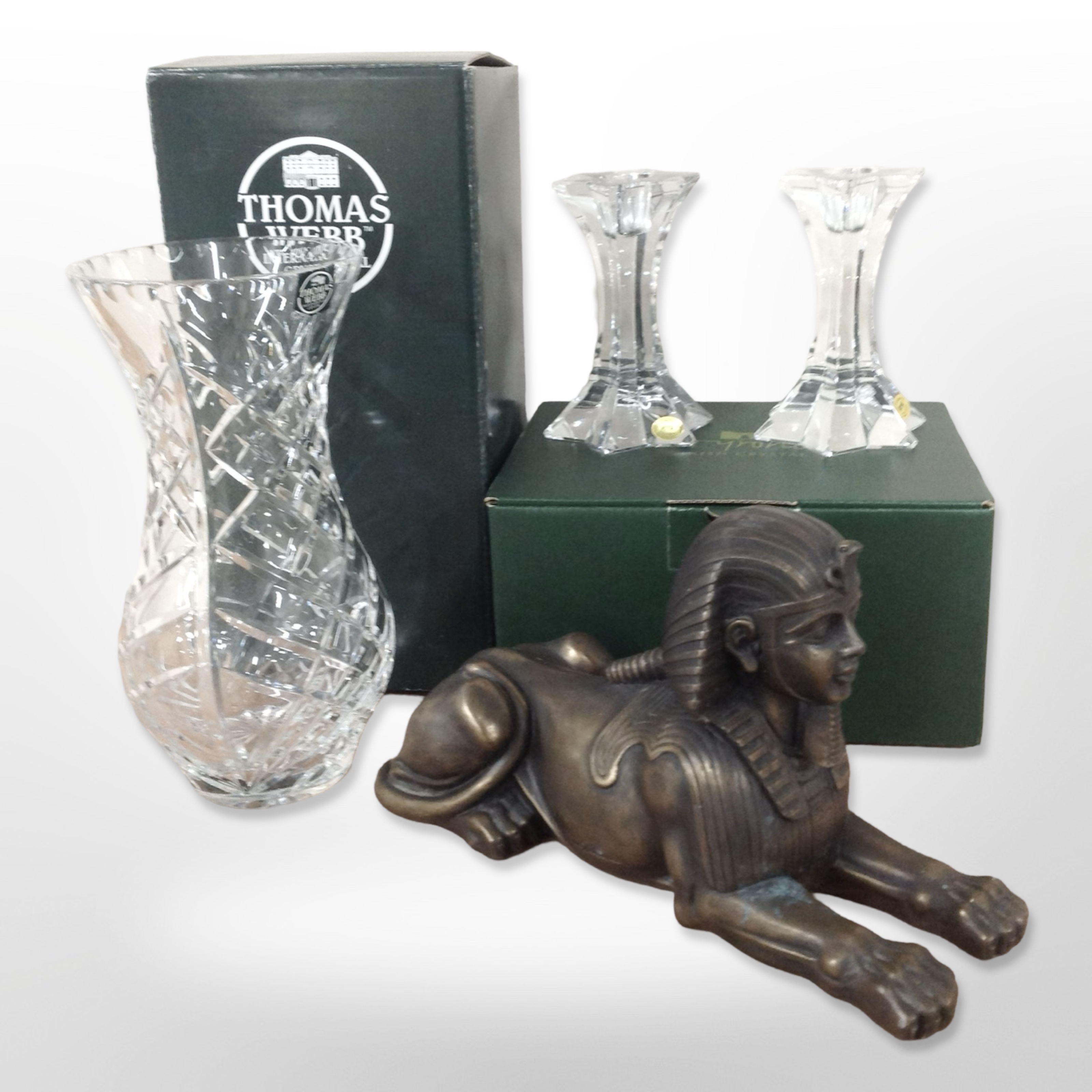 A Thomas Webb crystal vase, a further pair of Irish Tyrone crystal candlesticks,