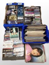 A large quantity of vinyl LP records, CDs, and DVDs.