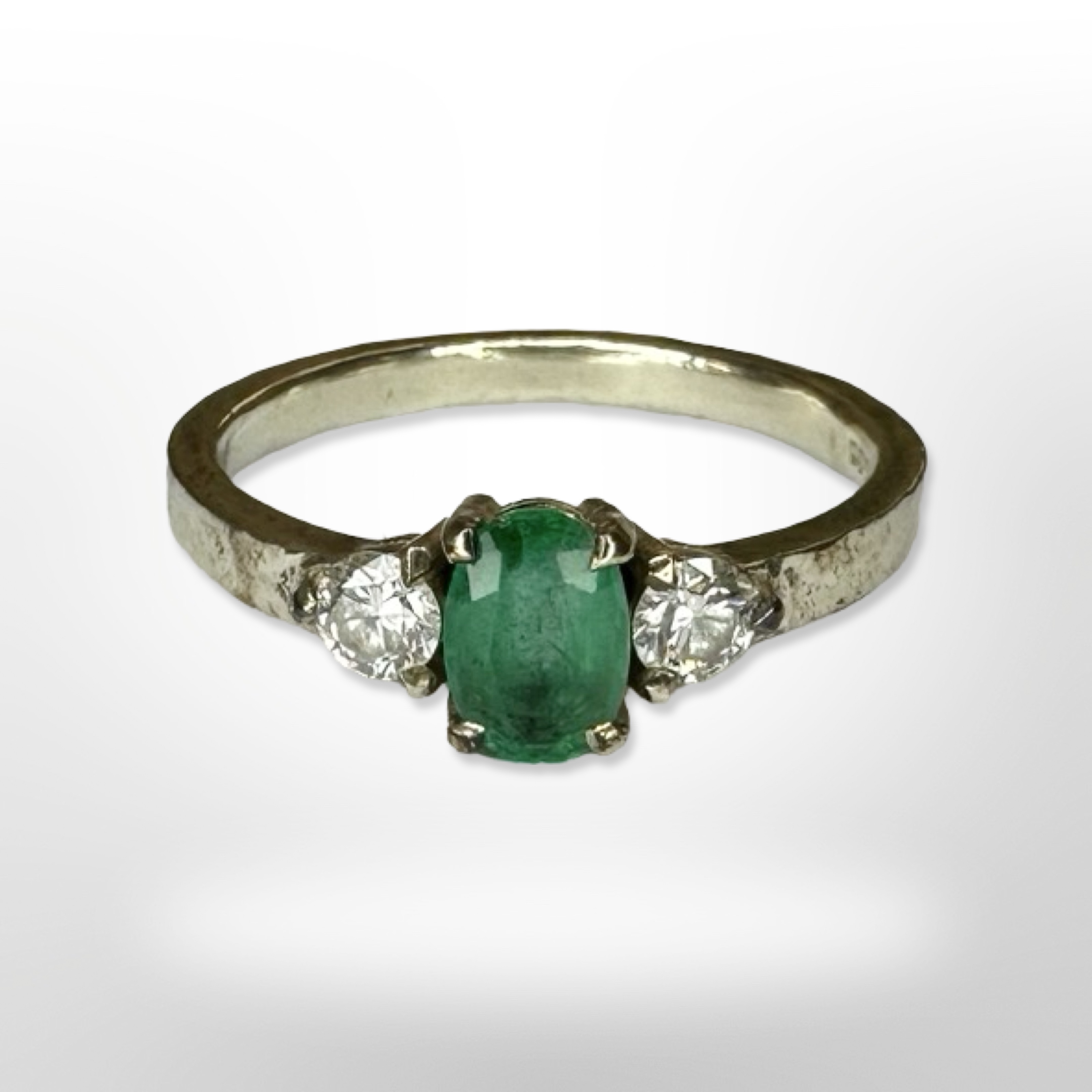 A 9ct white gold synthetic emerald dress ring, size L.