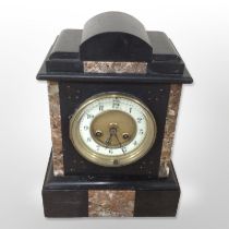 A Victorian black slate and rouge marble mantle clock, height 27cm,