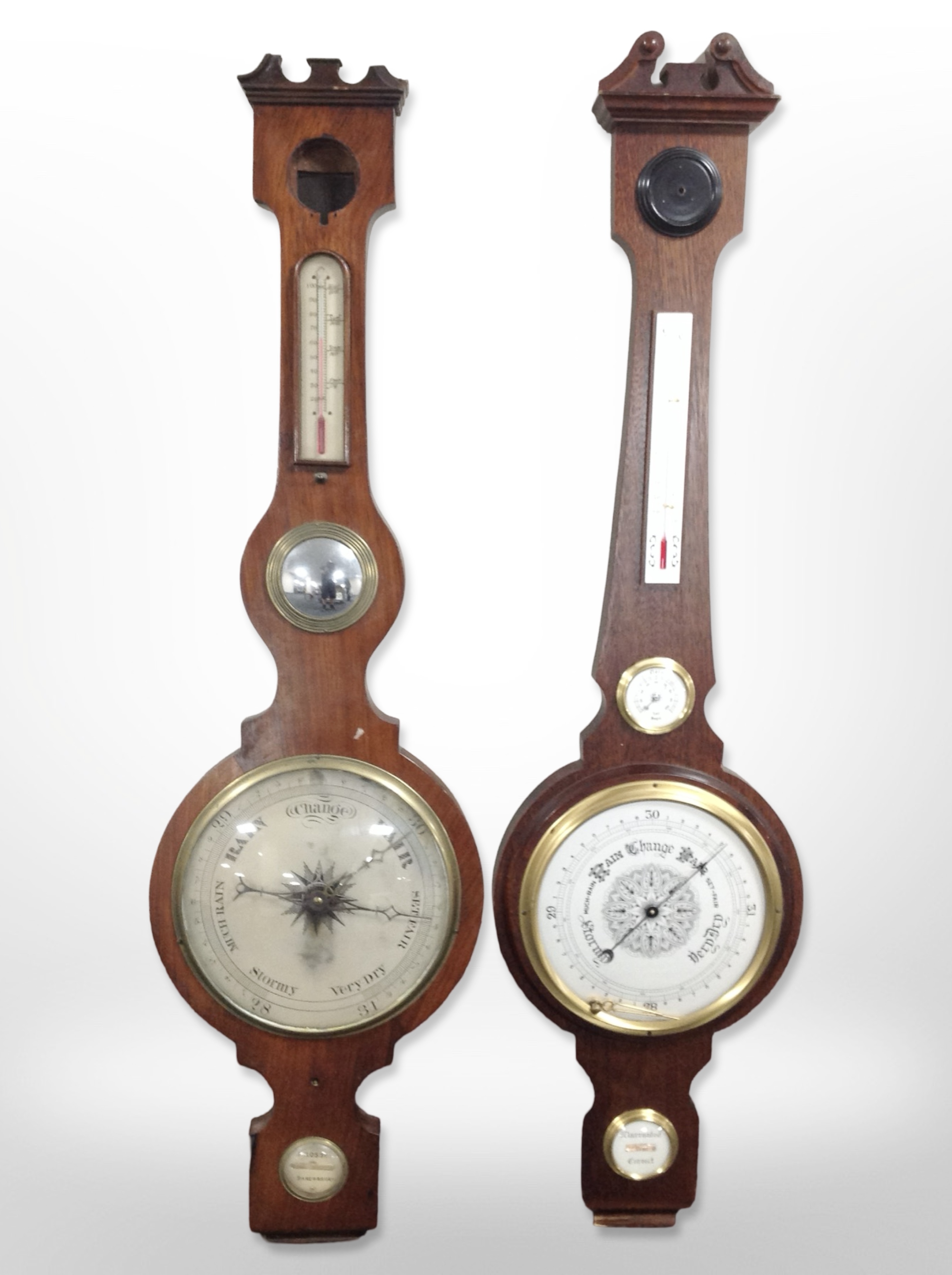 A mahogany banjo barometer with silvered dial, and a further rosewood barometer.