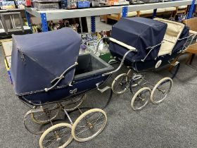 Two mid-20th century silver cross prams.