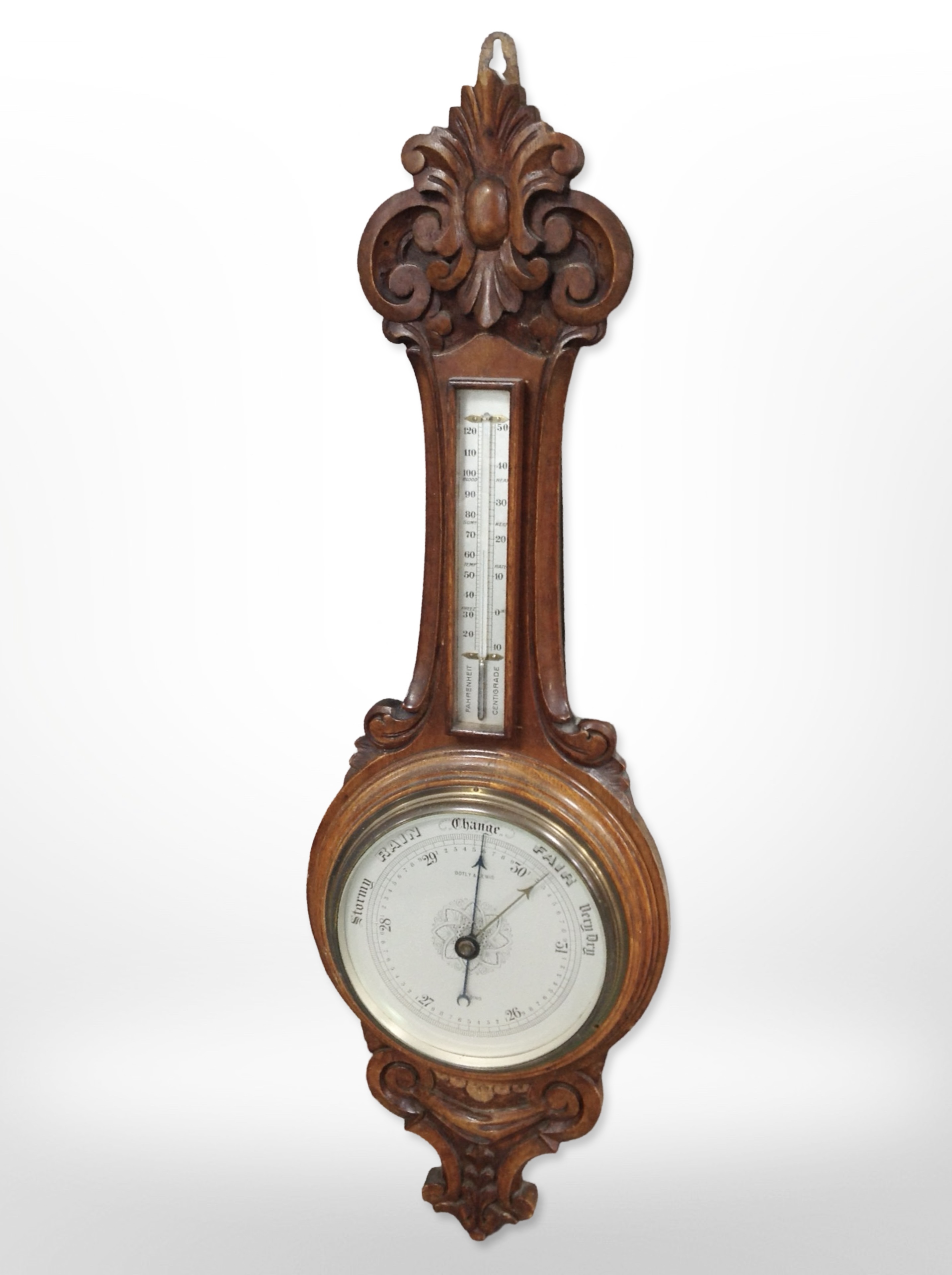 A carved oak banjo barometer by Botly & Lewis of Reading, length 90cm.