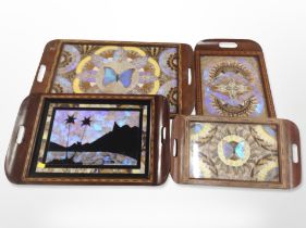 Four graduated butterfly wing trays,