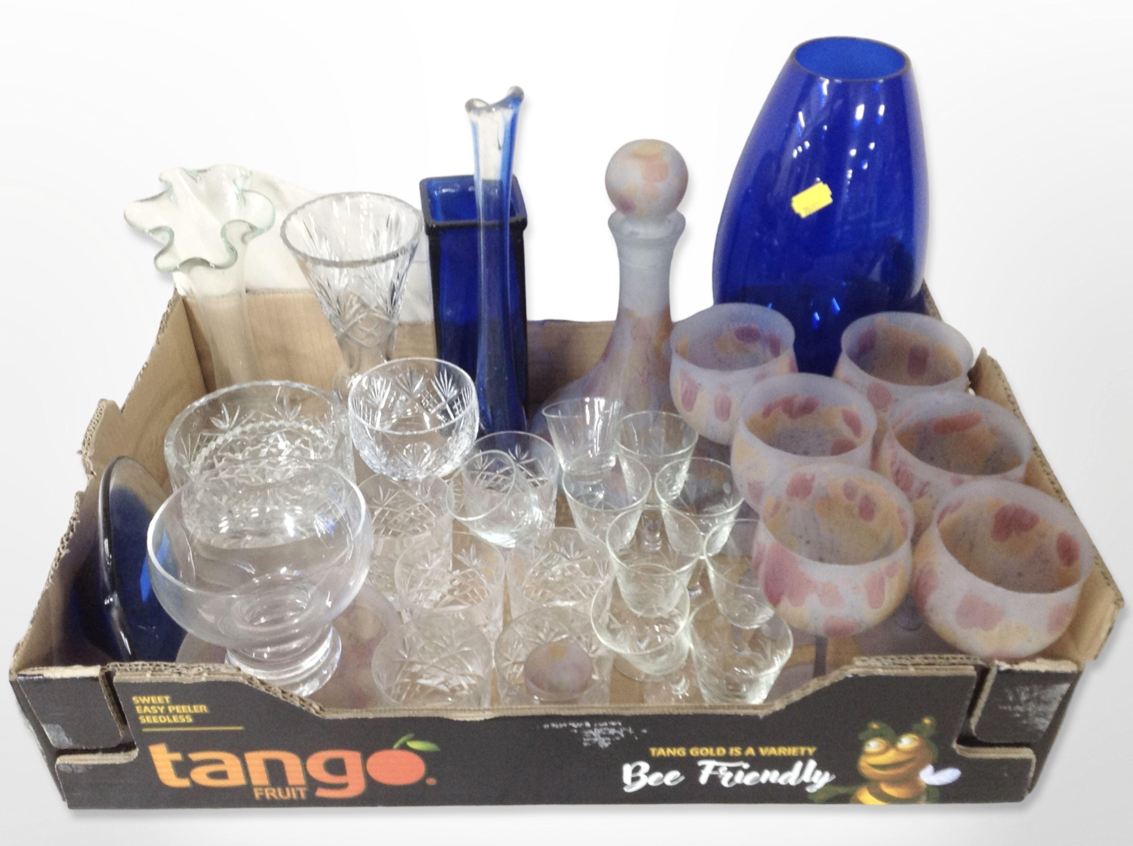 A group of studio glass vases, assorted etched drinking glasses,