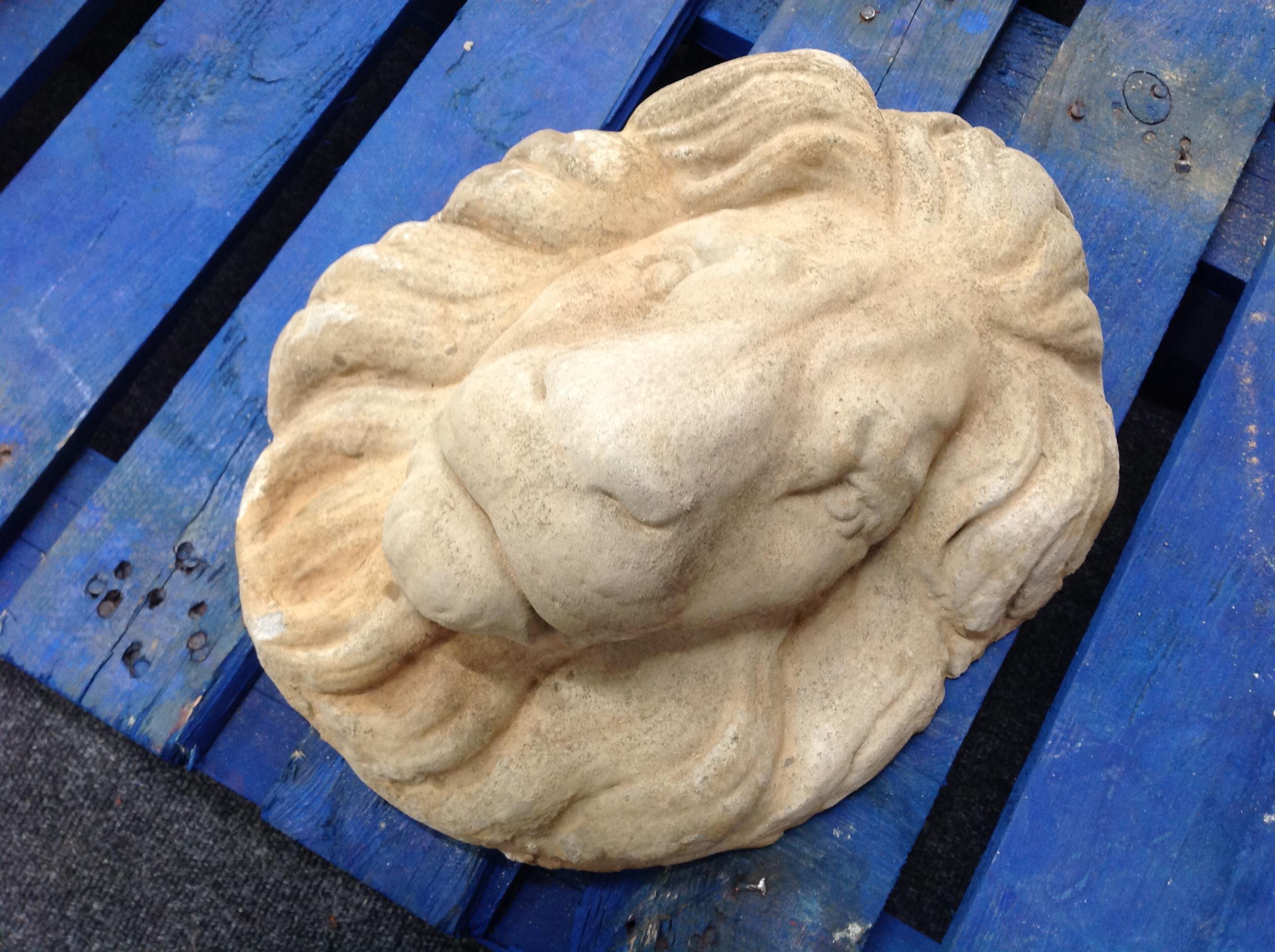 A concrete lion mask,